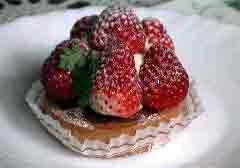 picture of pastry cake topped with strawberries